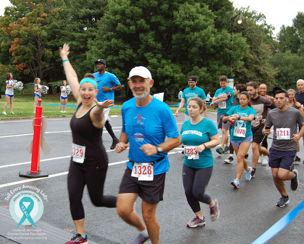 teal walk ovarian cancer run 5k runners smiling